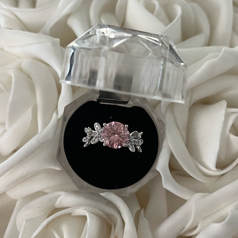 Pink ring with zircon flower accents